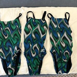 Three Speedo Endurance team suits size 28.